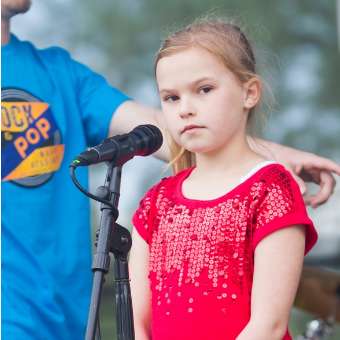Young Wrenn Van on stage. 